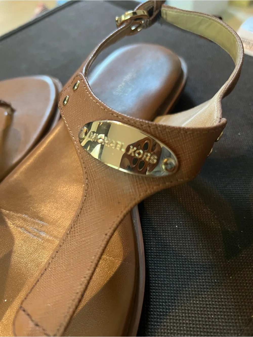 Michael Kors Brown Leather T-Strap Sandals with Gold Logo Plaque